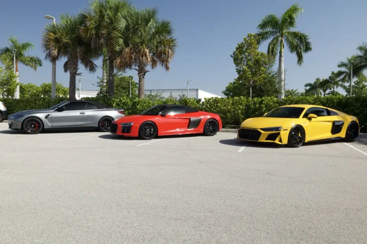 Three premium vehicles outside Imperial Auto Lab in Palm Beach County
