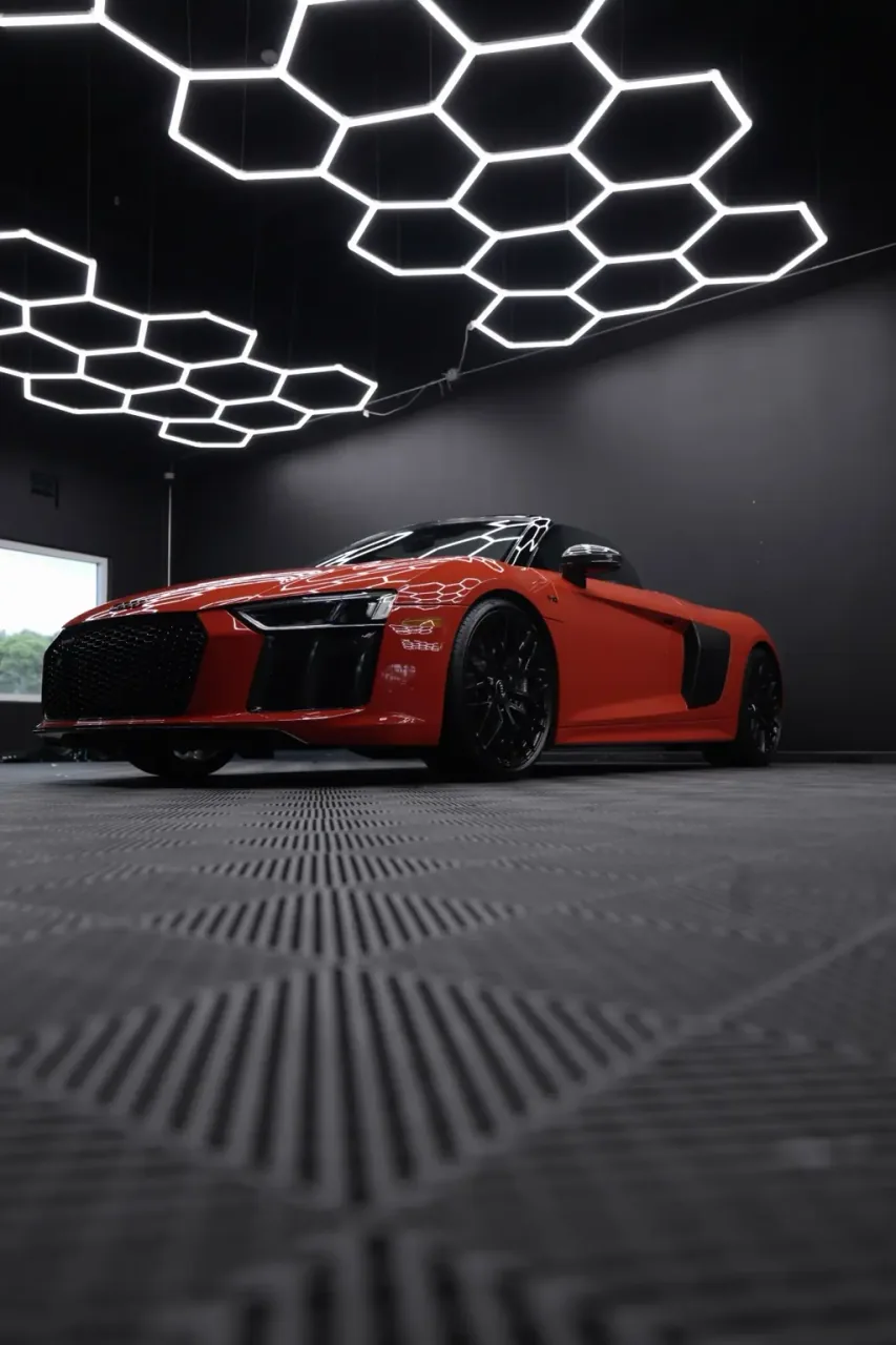 Red Audi R8 front in the Imperial Auto Lab studio