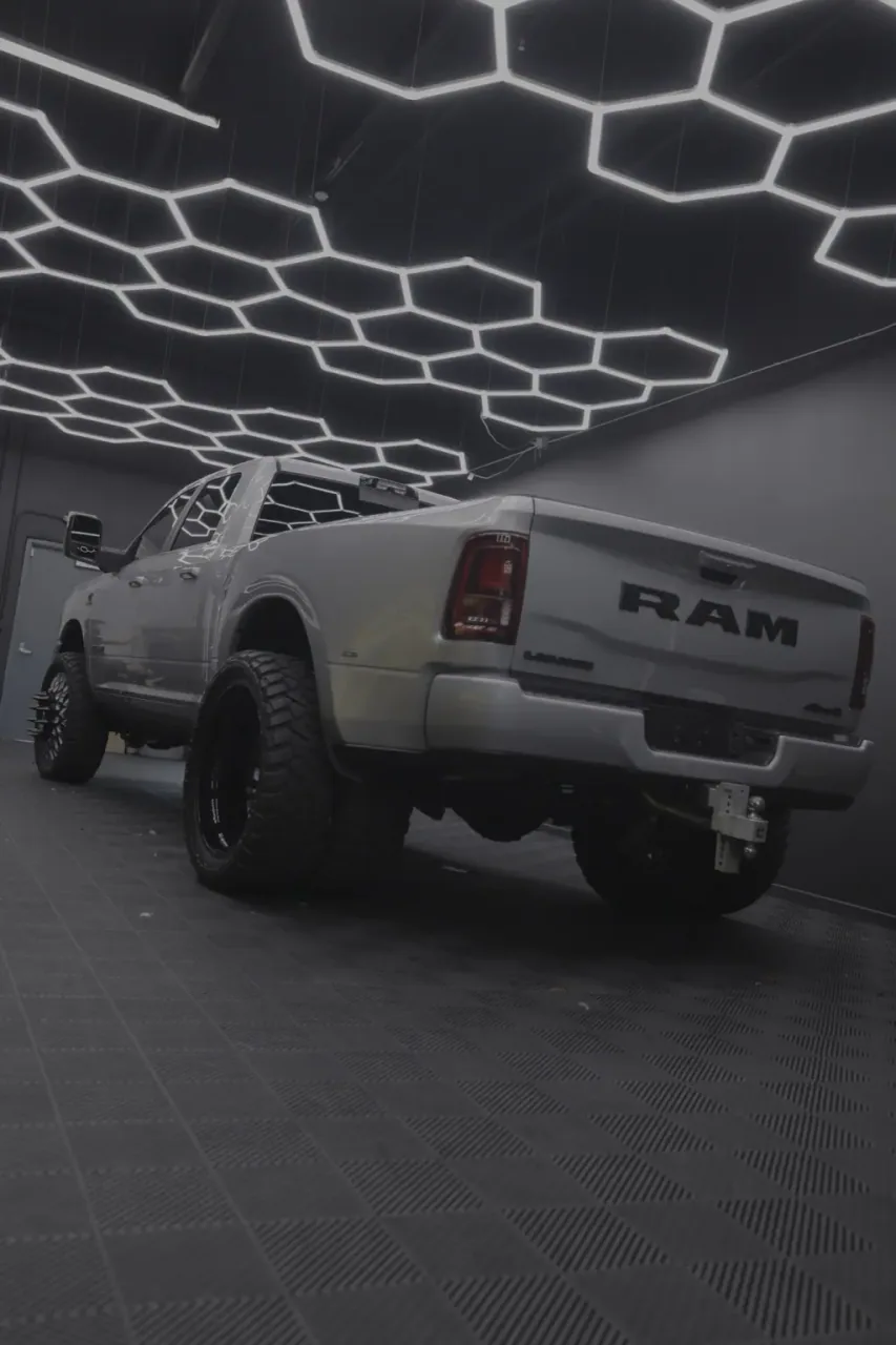 Silver RAM truck rear in the Imperial Auto Lab studio