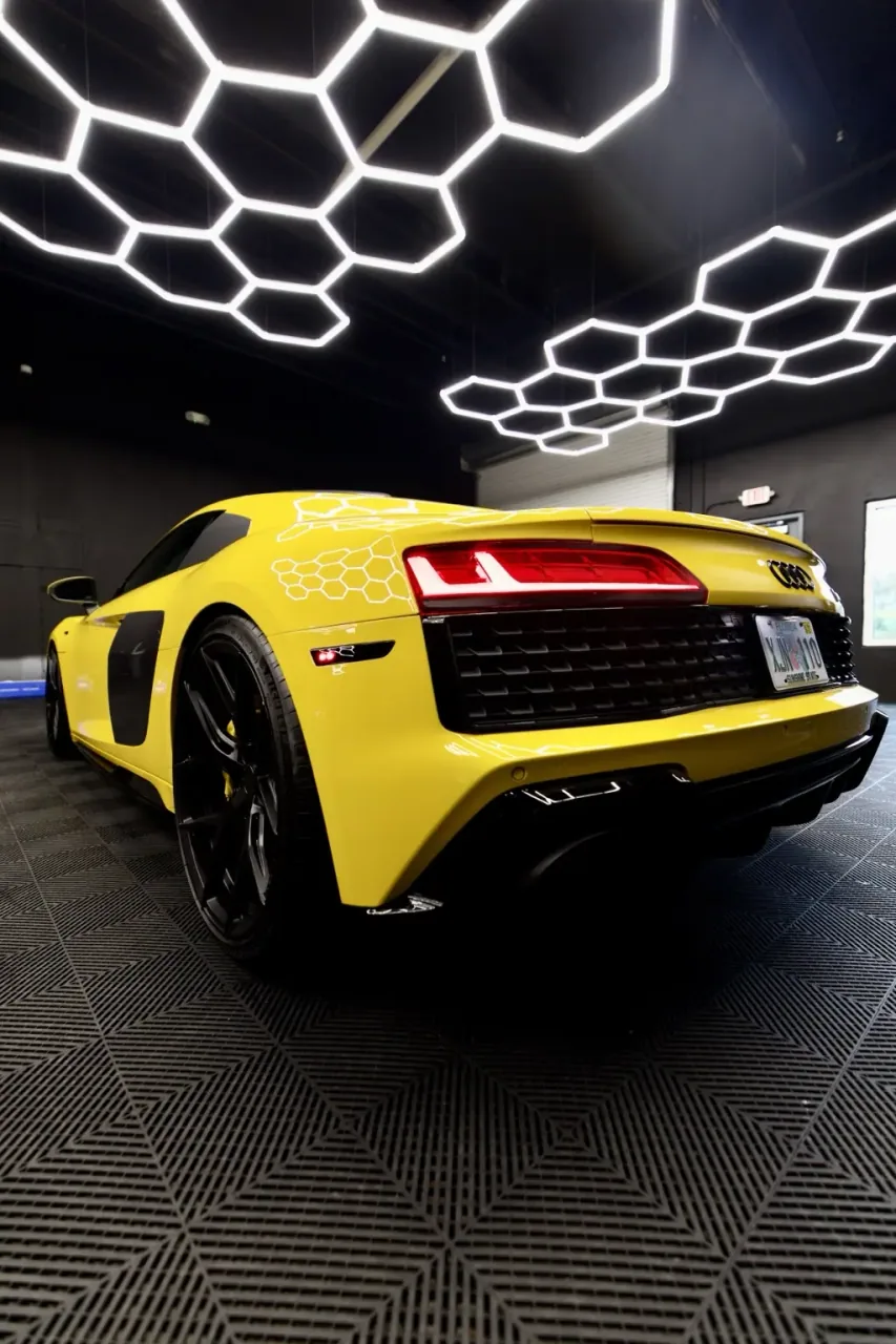 Yellow Audi R8 rear in the Imperial Auto Lab studio